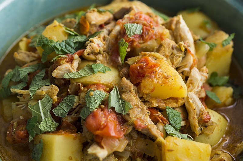 This image released by Milk Street shows a recipe for Cape Malay Chicken Curry. (Milk Street via AP)