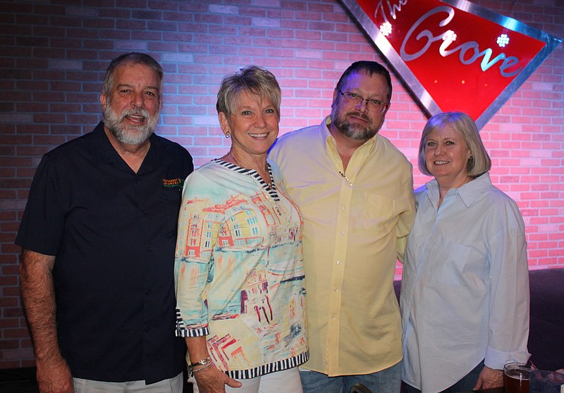 Northwest Arkansas Food Bank President CEO Kent and Diana Eikenberry (from left) with Jason and Karen Howard welcome food bank backers to the Stand Up for Hunger benefit April 21 at The Grove Comedy Club in Lowell.

(NWA Democrat-Gazette/Carin Schoppmeyer)