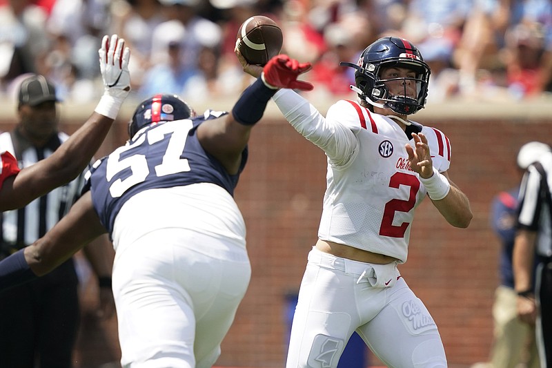 Mississippi quarterback Jaxson Dart (2) passes against the Red team in the first half of The Grove Bowl, Mississippi's NCAA college spring football game, Saturday, April 23, 2022, in Oxford, Miss. (AP Photo/Rogelio V. Solis)