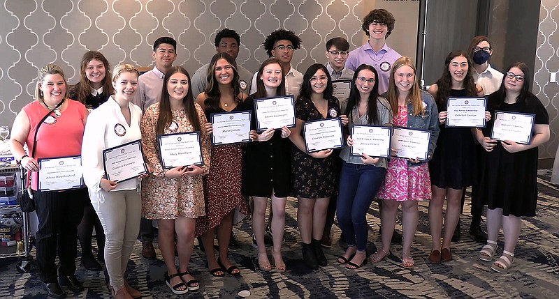 Local students hold their certificates after being awarded scholarships by the Hot Springs National Park Rotary Club during the club’s weekly meeting Wednesday at the DoubleTree by Hilton Hot Springs. - Photo by Donald Cross of The Sentinel-Record