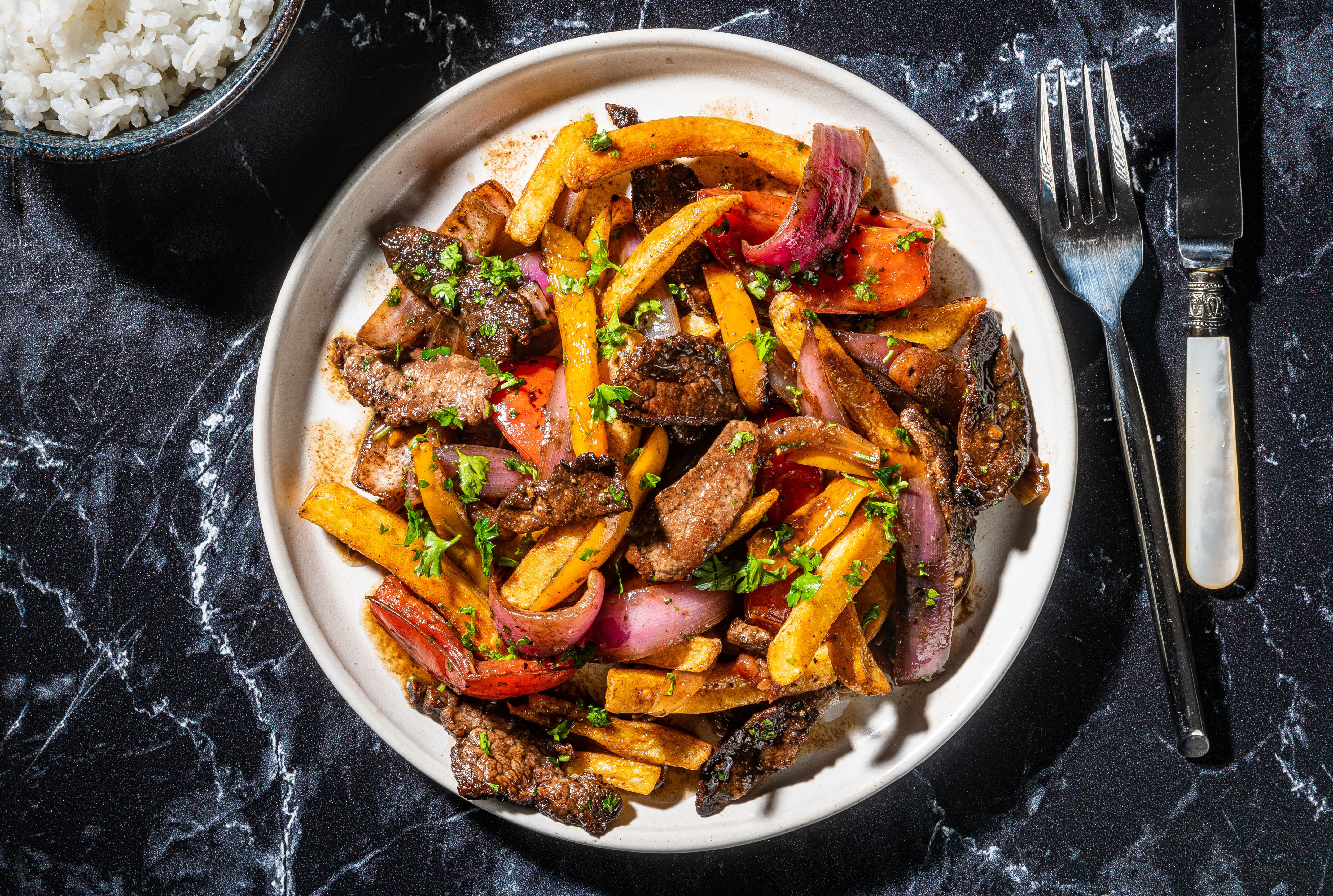 COOKING FOR TWO: Smoking the wok key to making lomo saltado - Vimarsana News