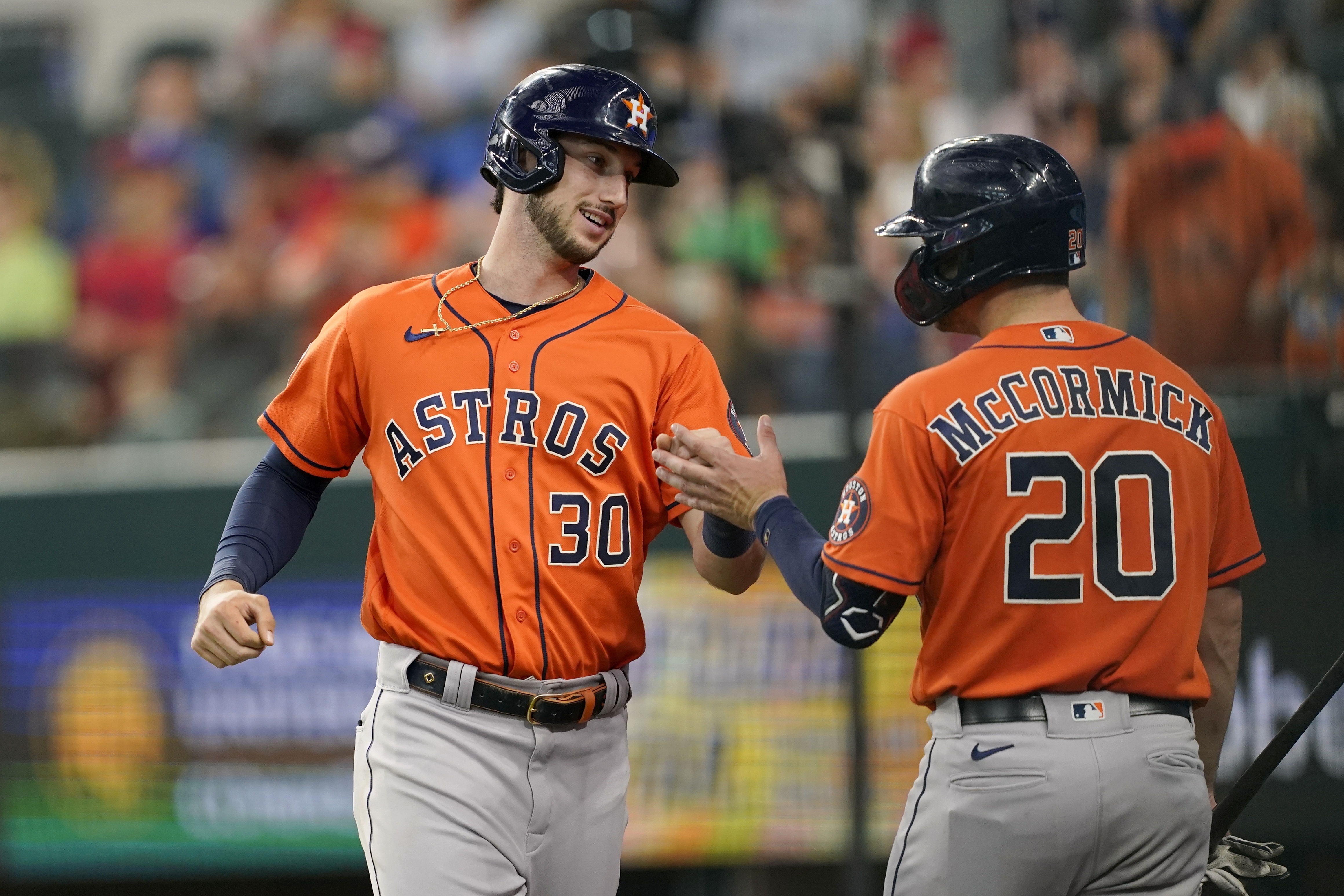 Houston Astros' Kyle Tucker rounds the bases after hitting a three