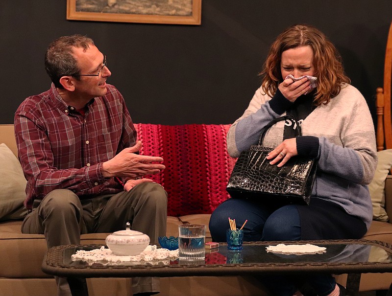 Rich Burdge, left, and Tiffany Garnett practice a scene during a rehearsal for their production of "Last of the Red Hot Lovers" on Thursday, April 28, 2022, at Scene One Theater in Jefferson City. (Kate Cassady/News Tribune photo)
