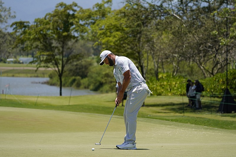 Jon Rahm, of Spain, putts on the sixth hole during the third round of the Mexico Open at Vidanta in Puerto Vallarta, Mexico, Saturday, April 30, 2022. (AP Photo/Eduardo Verdugo)