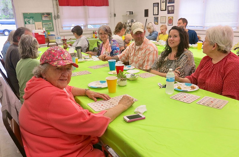 Westside Eagle Observer/SUSAN HOLLAND
Bingo players pause between games during a Friendly Neighbors fundraiser Friday evening, April 29, at the Sulphur Springs Community Center. The Friendly Neighbors served hot dogs, salads and desserts. Donations were accepted and more than $300 was raised for park improvements and a scholarship fund.