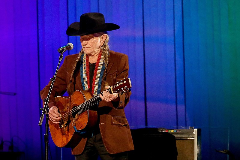 Willie Nelson performs in a 2019 file photo. At the age of 89, Nelson has embarked on another meandering concert tour to promote his new album. He plays Little Rock on May 31; El Dorado on June 22; and Rogers on July 1. (Getty Images/TNS/Terry Wyatt)