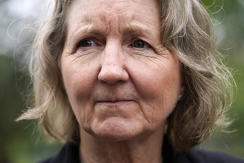 Elizabeth Whelan, sister of U.S. Marine Corps veteran and Russian prisoner Paul Whelan, speaks with reporters before a news conference with families of Americans currently being held hostage or wrongfully detained overseas in Lafayette Park near the White House, Wednesday, May 4, 2022, in Washington. (AP Photo/Patrick Semansky)