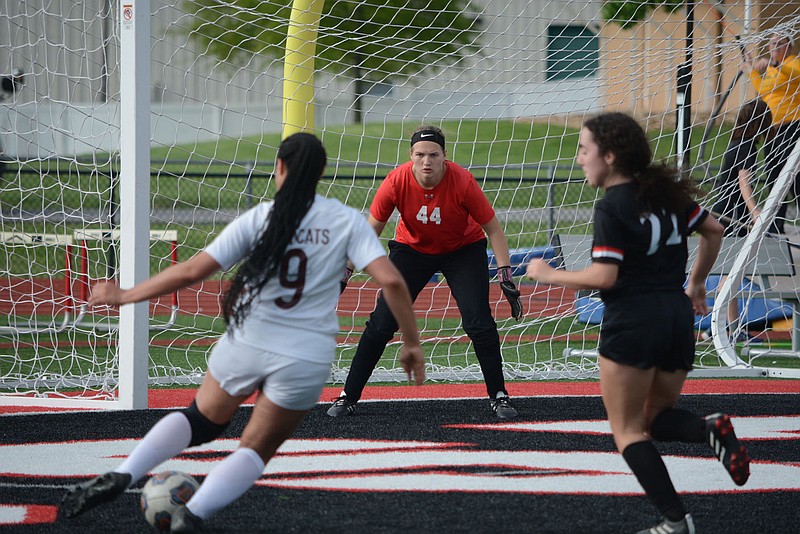 BENNETT HORNE/MCDONALD COUNTY PRESS McDonald County junior keeper Samara Smith (44) prepares to defend against a shot during her team's loss to Logan-Rogersville on Friday, May 6.