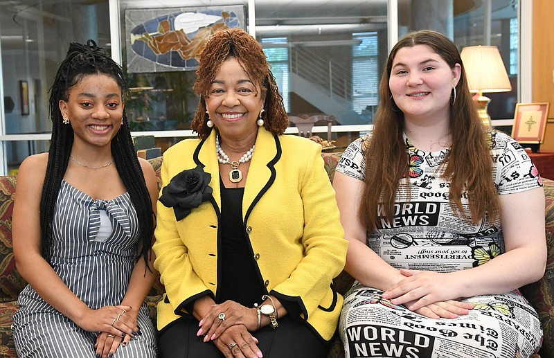 Adrienne Conley, center, the founder of Unlimited Resources, is shown with Makayla Watson, left, and Larissa Britain at First United Methodist Church. The organization offers mentorship to young ladies, such as Watson and Britain. - Photo by Tanner Newton of The Sentinel-Record
