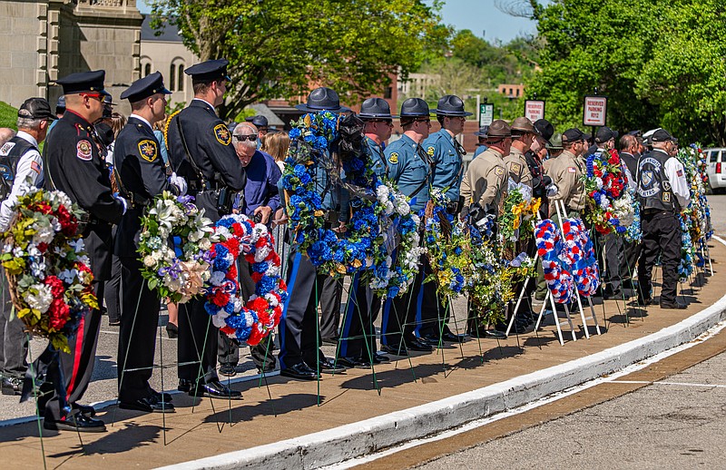 Various law enforcement agencies presented wreaths to honor their fallen Saturday at the Missouri Law Enforcment Memorial Service at the Capitol.  (Ken Barnes/News Tribune)