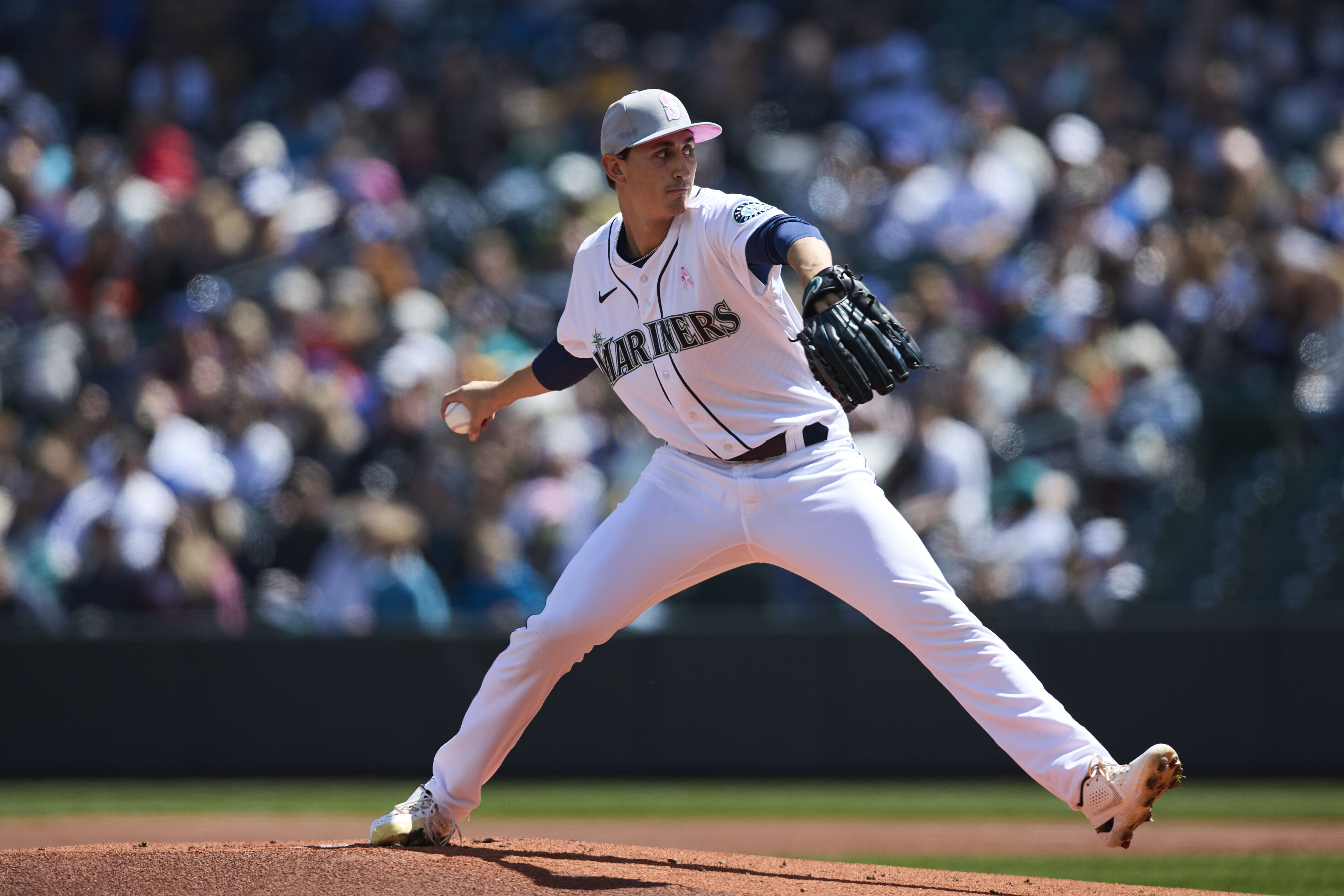 Seattle Mariners' Luis Torrens reacts after he slid safely home to score on  a RBI single hit by Ty France during the sixth inning of a baseball game  against the Houston Astros