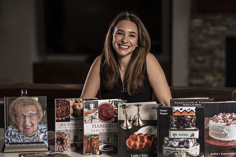 A portrait of Rachel Ingber with some of the heirloom cookbooks she has helped create, in Plymouth, Minnesota, on Monday, April 25, 2022. Rachel's husband's grandmother, Nana Minnie, was one of her inspirations for doing this work. (Jerry Holt/Minneapolis Star Tribune/TNS)