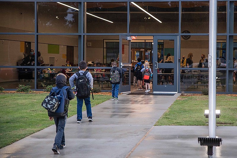 Students file into Margaret Fischer Davis Elementary School on the campus' opening day Nov. 9, 2020. A political action committee formed by Pleasant Grove Independent School District found that the elementary, the district’s newest campus, does not need significant repairs or improvements. Instead, funds from the recently approved $39.9 million bond will go to improvements and constructions at the district's other campuses. (Gazette staff photo)