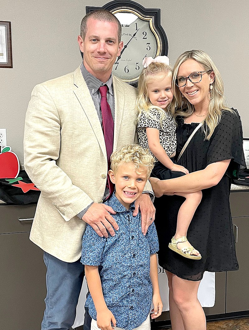 Leonard Ogden, new principal for Pea Ridge High School, with his family, wife Jessica, and children Gunnar and MaddyGrace.
