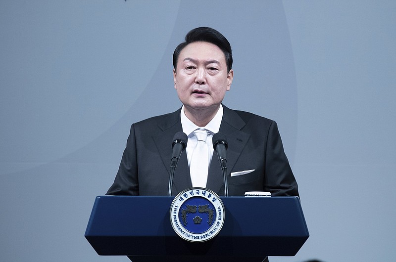 South Korean President Yoon Suk Yeol speaks during an inaugural dinner at a hotel in Seoul, South Korea, Tuesday, May 10, 2022. (Jeon Heon-Kyun/Pool Photo via AP)