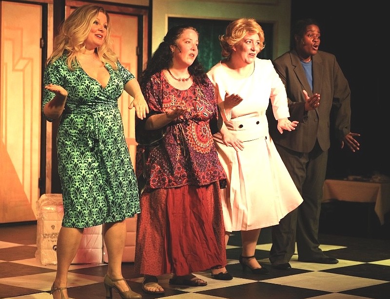 Emory Molitor, (from left) Monica Clark-Robinson, Kelley Ponder and Nisheedah Golden star in “Menopause The Musical” at Murry’s Dinner Playhouse in Little Rock. (Special to the Democrat-Gazette)