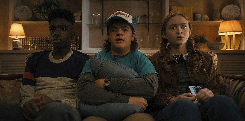 “Stranger Things” is back for Season 4 with Caleb McLaughlin as Lucas Sinclair (from left), Gaten Matarazzo as Dustin Henderson and Sadie Sink as Max Mayfield. (Netflix/TNS)