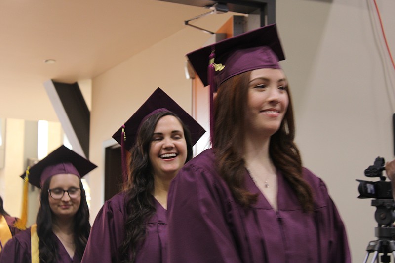 Graduating students in SouthArk's Health Sciences program enter the Spring Commencement ceremony held Thursday at the El Dorado Conference Center. (Caitlan Butler/News-Times)