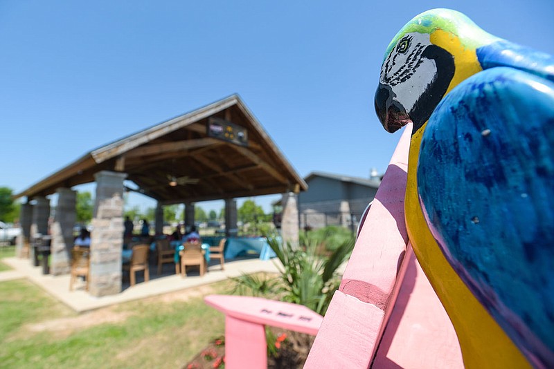 Employees of Parrot Island Waterpark and media members attend a luncheon on Thursday, May 12, 2022, at the waterpark in Fort Smith. Chad Jones with Rightmind Advertising addressed attendees to announce attractions and events for Parrot Island's 2022 season, which kicks off this weekend and will remain open on weekend before opening daily following Memorial Day Weekend through Aug. 14. Notable events will include Girl Scouts Day on June 16 and July 14, Educators Day on July 9, First Responders Day on July 16, Military Day on July 23 and Healthcare Workers Day on July 30. Visit nwaonline.com/220514Daily/ for today's photo gallery.
(NWA Democrat-Gazette/Hank Layton)