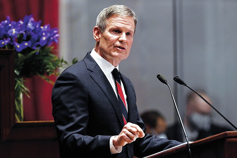 FILE - Tennessee Gov. Bill Lee delivers his State of the State address in the House Chamber of the Capitol building, Monday, Jan. 31, 2022, in Nashville, Tenn.  On Friday, May 13, The Associated Press reported on stories circulating online incorrectly claiming newly signed legislation in Tennessee “banned Plan B and made it a crime punishable by a $50,000 fine to order it.”(AP Photo/Mark Zaleski, File)
