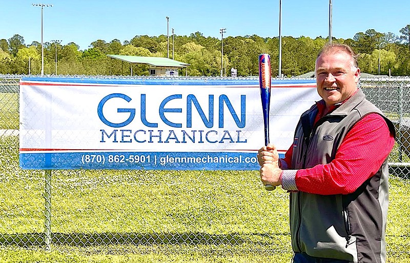 Brent McDiarmid, of Glenn Mechanical, fires up a swing in front a banner at the El Dorado-Union County Recreation Complex. Glenn Mechanical is a grand slam sponsor of six banners that are posted on outfield fences. The complex commission is working with the Diamond Agency to secure at least 20 such sponsorships this year. Glenn Mechanical is one of 14 sponsors to sign up or renew so far. Others include FACT, Inc., Physical Therapy Center of South Arkansas and Rep. Matthew Shepherd. (Contributed)