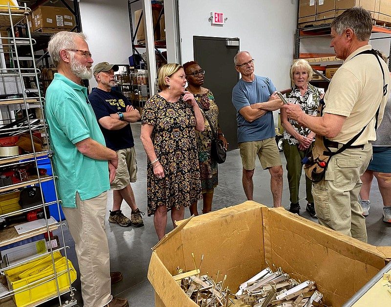 Submitted
Gary Moreau, right, explains the procedure for assembling handles for mobility carts to Rotarians Bob Sterner, Bob Hansen, Debbie Laughlin, Coletta Williams, Steve Long and Jan Reyes.
