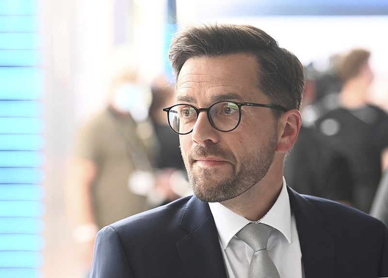 Thomas Kutschaty, SPD top candidate for the state  for the state election in North Rhine-Westphalia, looks on, in the state parliament, on the evening of the state election, in North Rhine-Westphalia, Germany, Sunday, May 15, 2022. Voters backed the incumbent conservative governor and dealt a blow to Chancellor Olaf Scholz?s Social Democrats on Sunday in Germany?s most populous state, projections based on partial counts showed. (Boris Roessler/dpa via AP)