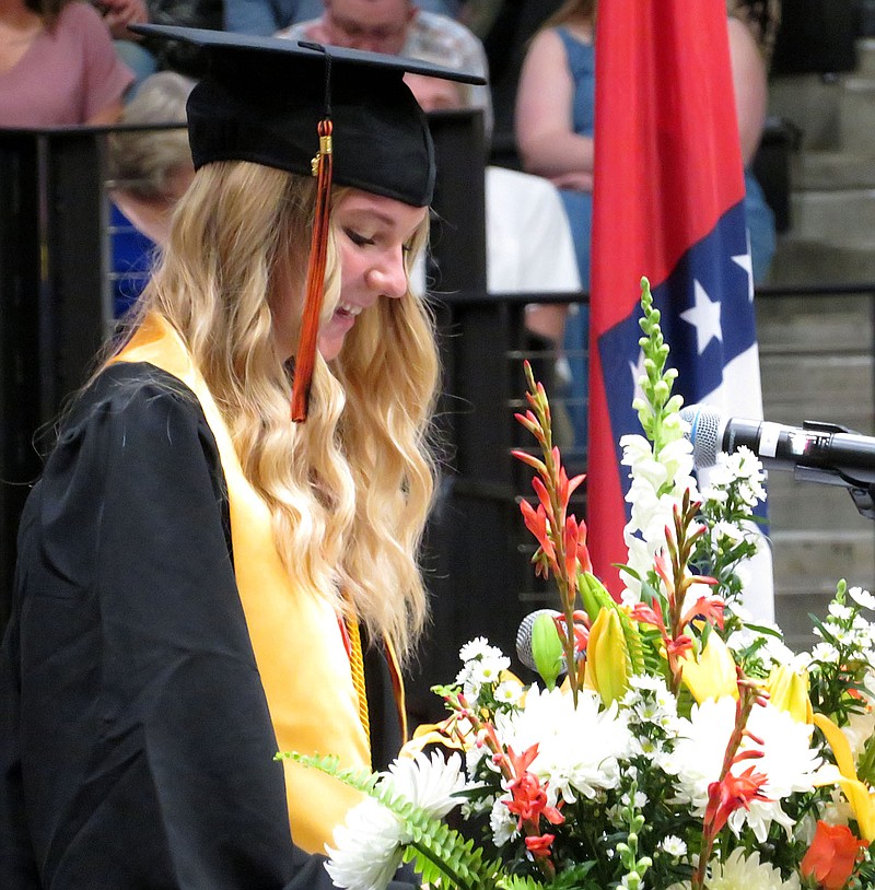 Westside Eagle Observer/RANDY MOLL
Gravette high honors student Sara Satchel addresses her classmates and guests during the Saturday morning graduation ceremonies at Gravette High School.