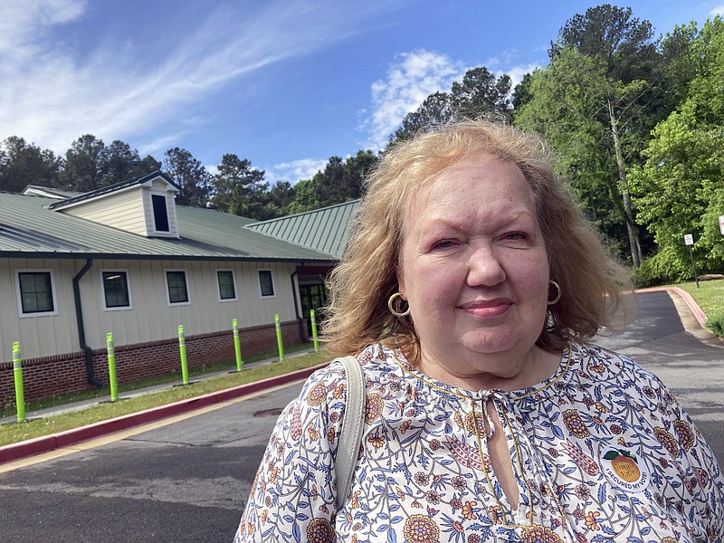 Ursula Gruenewald, a resident of Acworth, Ga., cast her ballot at an early voting site on Friday, May 6, 2022. Gruenewald, who usually votes by mail, said she had a difficult time navigating recent changes to the mail voting process in Georgia and decided to vote at the early voting site to avoid the possibility of long lines on Election Day.(AP Photo/Christina A. Cassidy)