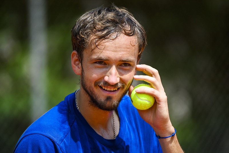 Daniil Medvedev, tennis player from Russia, reacts during a training session at the ATP 250 Geneva Open tennis tournament in Geneva, Switzerland, Sunday, May 15, 2022. (Jean-Christophe Bott/Keystone via AP)