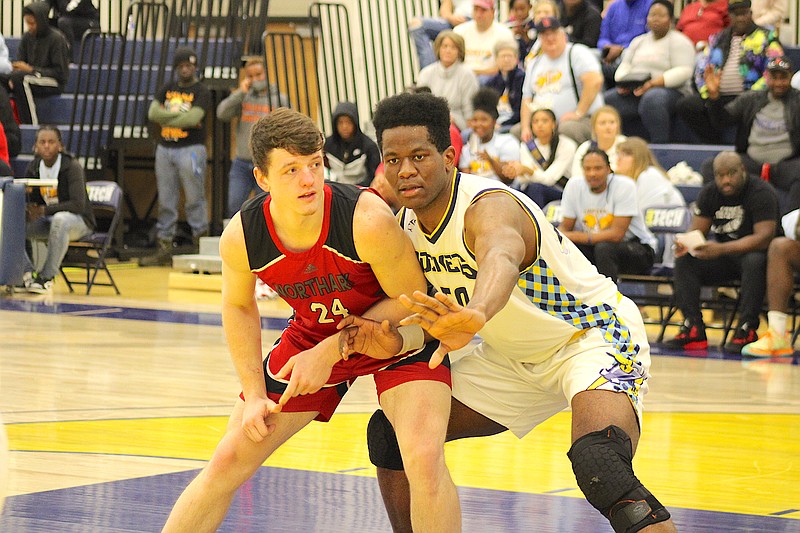 Photo By: Michael Hanich
SAU Tech center Great Nwachukwu defends against a player in the game against North Arkansas.