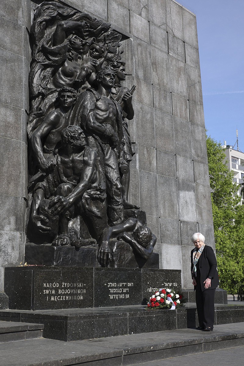 U.S Treasury Secretary Janet Yellen lays a wreath in front of the Ghetto Heroes Monument in Warsaw, Poland, Monday, May 16, 2022. (AP Photo/Michal Dyjuk)