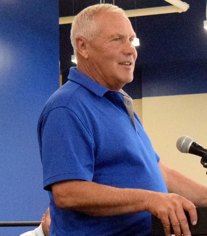 Westside Eagle Observer/MIKE ECKELS
Coach Shane Holland makes his final track award presentation during the 2022 Decatur High School Athletic Banquet in Decatur May 16. Holland retires from coaching after 40 years, 11 of which were spent at Decatur.