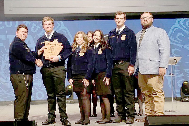 COURTESY PHOTO
Farmington FFA's Livestock Evaluation team received championship honors at the state FFA convention in Hot Springs. Team members are Wyatt Hunt, Chloe Mary, Shelby Earnheart and Austin Rogers. Clayton Sallee, right, is FFA sponsor.