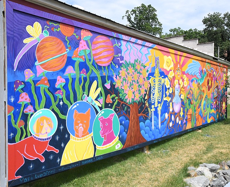 Numerous local art students collaborated with artist Danaé Brissonnet to create a new mural at David F. Watkins Memorial Park. - Photo by Tanner Newton of The Sentinel-Record Tanner Newton