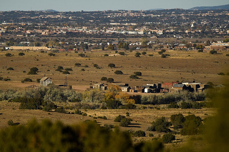 Buildings at the Bonanza Creek Ranch film set, near where a crew member was fatally shot during production of the western film "Rust," are seen on Oct. 28, 2021, in Santa Fe, New Mexico. Filming will resume once the sheriff's office is done investigating the shooting death of cinematographer Halyna Hutchins. (Patrick T. Fallon/AFP/Getty Images/TNS)