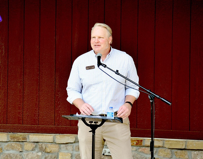 Marc Hayot/Herald-Leader Jason Wilkie, executive director of Camp Siloam made the opening address for the dedication of the new Chinchilla Bunkhouse on Friday. The new bunkhouse replaces the Moose Bunkhouse which was destroyed when two tornadoes touched down on Oct. 21, 2019 in Siloam Springs.