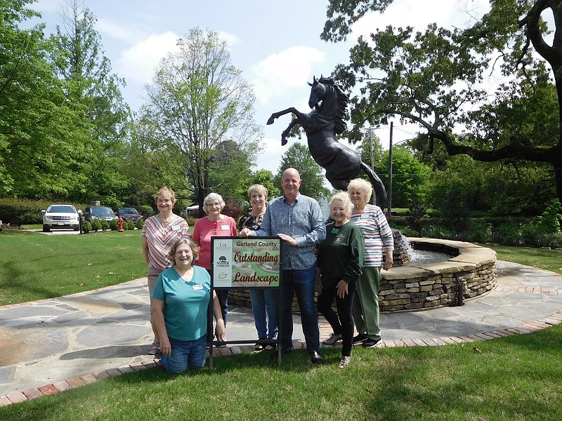 From left are Master Gardeners Gaye Harper, Sunshine Spielvogle and Jennetta Sanders, owners Rhonda and Mark McMurry, and Master Gardeners Cindy Hartt and Carolyn Davis. - Submitted photo