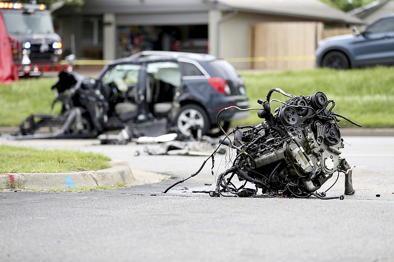 FILE - The scene of a fatality car crash, June 2, 2021, in Tulsa, Okla.  Nearly 43,000 people were killed on U.S. roads last year, the highest number in 16 years as Americans returned to the highways after the pandemic forced many to stay at home.  The 10.5% jump over 2020 numbers was the largest percentage increase since the National Highway Traffic Safety Administration began its fatality data collection system in 1975. (Tanner Laws/Tulsa World via AP, File)