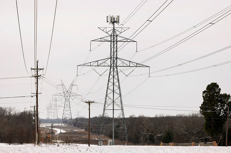Tom Fox/The Dallas Morning News/TNS
Large electrical transmission lines cross through South Arlington, Texas.