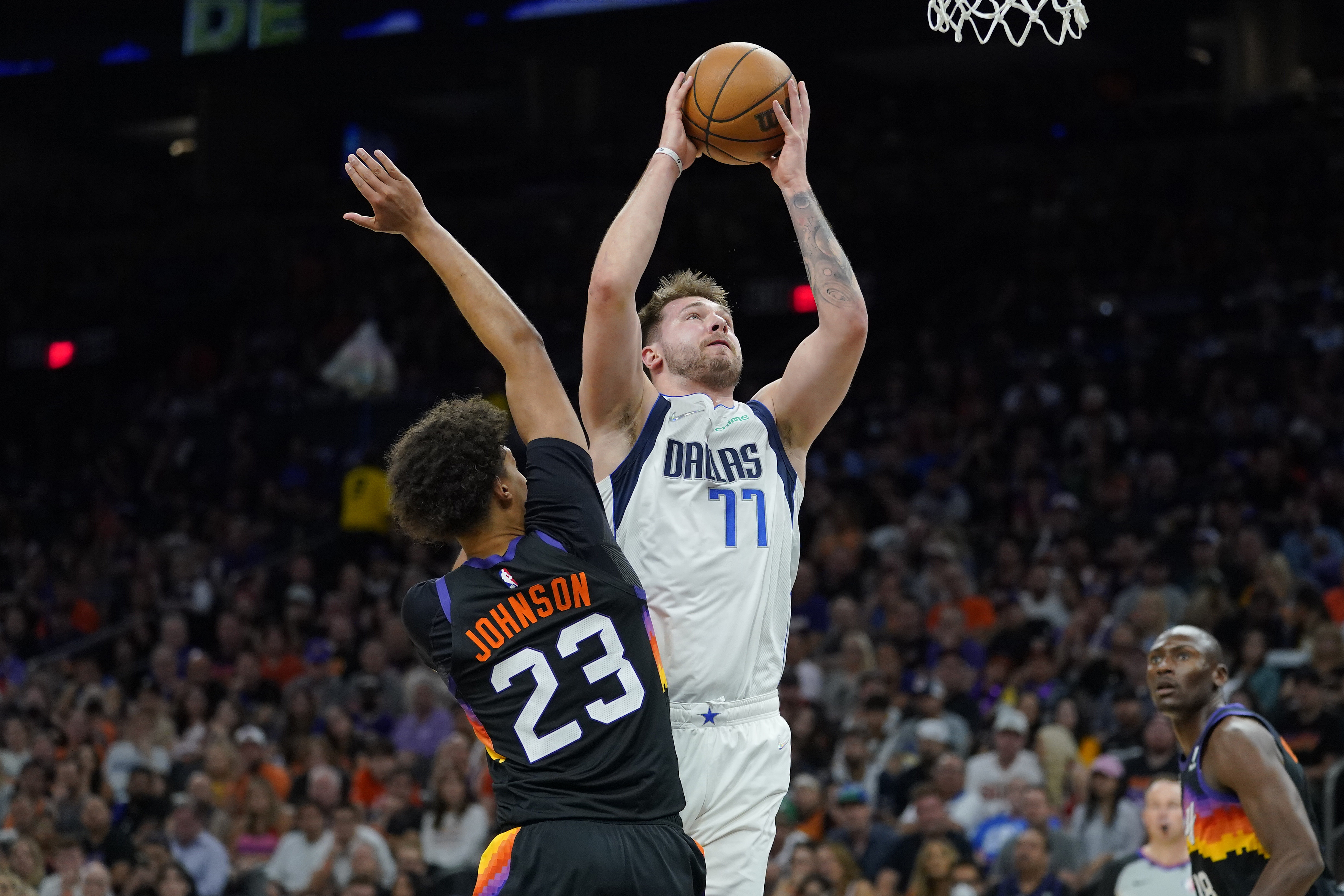 Phoenix Suns fans cheer during the first half of Game 3 of an NBA  basketball Western Conference semifinal game against the Denver Nuggets,  Friday, May 5, 2023, in Phoenix. (AP Photo/Matt York