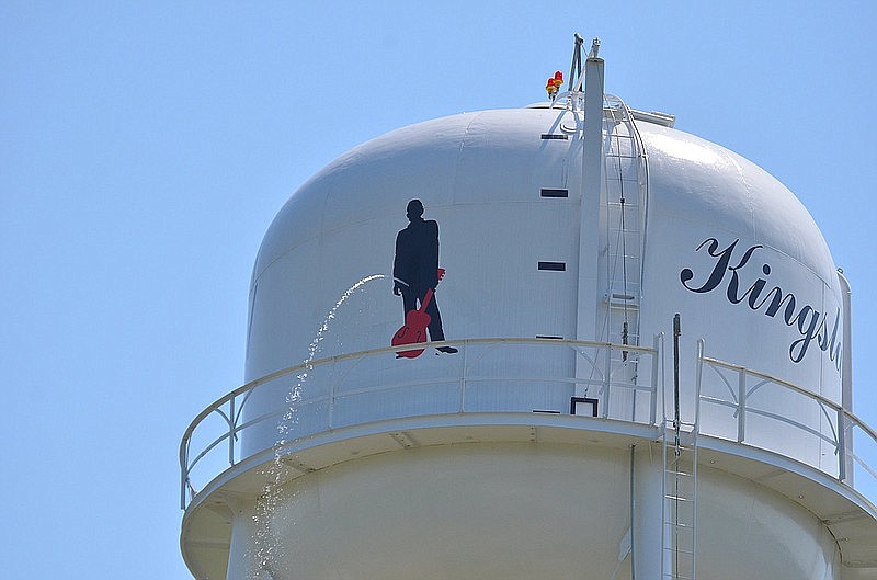 A silhouette of Johnny Cash was apparently the object of vandalism recently when someone shot a hole in the Kingsland water tank at a very precise location. (Special to The Commercial/Richard Ledbetter)