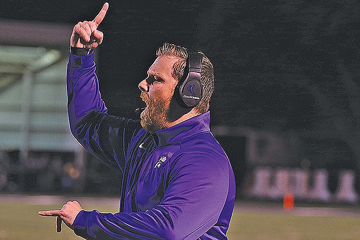 Defensive Coordinator Trey Outlaw signals his alignment for a play during a game in the 2019 season. Outlaw has been announced as the new Athletic Director and head football coach at Arkansas High on Tuesday, May 17, 2022.