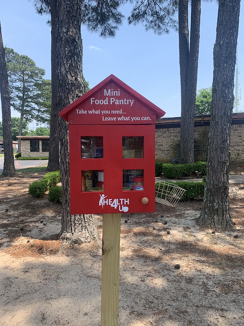 The mini food pantry is seen outside the ATCOG building in Texarkana Texas. The pantry is provided by a Texas State Health grant. Donations are welcome, and anyone in need of food is encouraged to take something. (Staff photo)