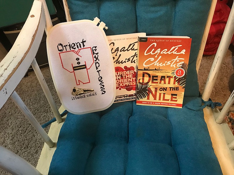 A springtime spent with a comfortable rocking chair and Agatha Christie has been a lot of fun for an inveterate reader — and inspired some cross-stitch art, too.

(NWA Democrat-Gazette/Becca Martin-Brown)