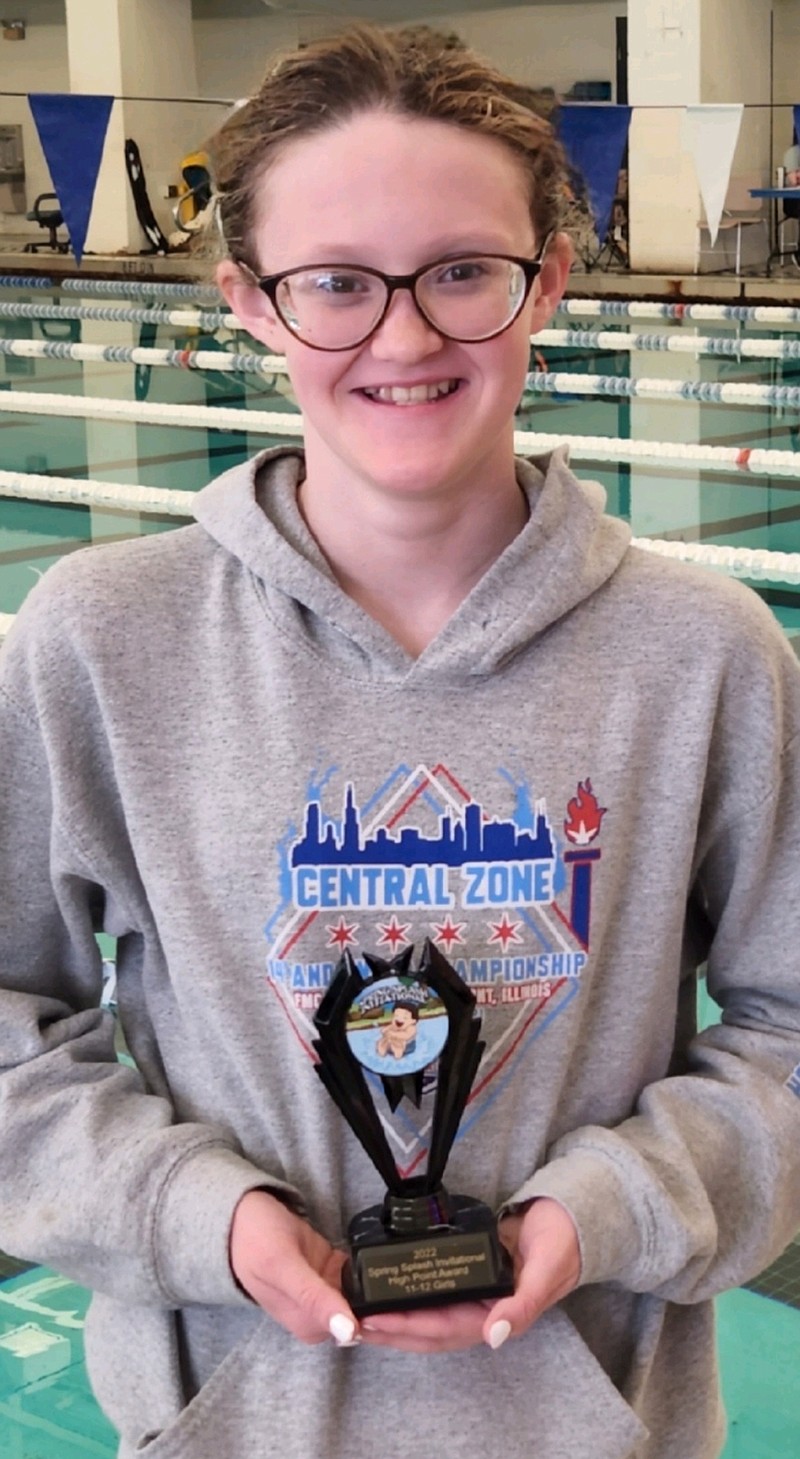 Lake Hamilton sixth-grade swimmer Aubrey Schmitt celebrates her wins at the USA-Spring Splash Invitational at the University of Arkansas at Little Rock. - Submitted photo