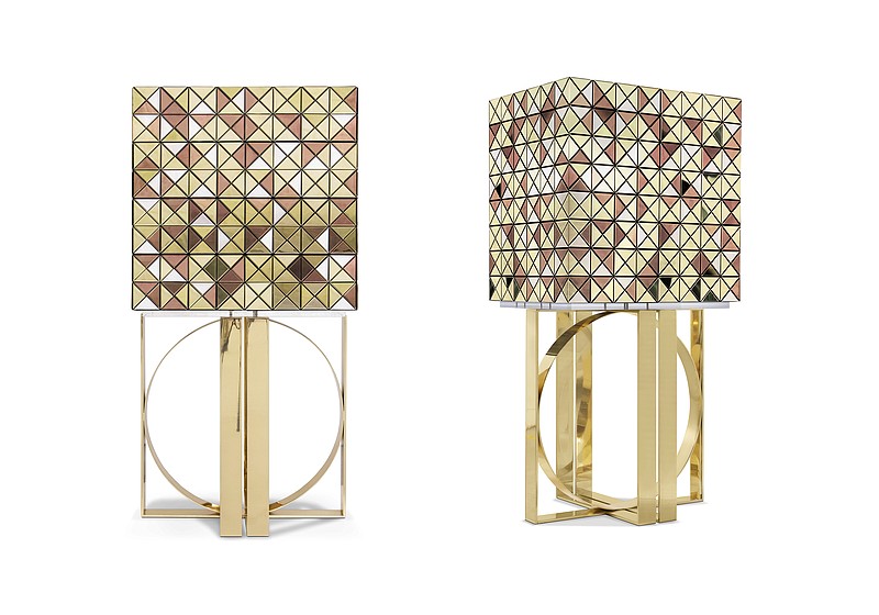 This combination of images released by Boca do Lobo shows the Pixel bar cabinet, clad in over a thousand multicolored triangles made of woods like palisander and African walnut, evoking a pixelated image. Inside, mirror and diamond-quilted blue silk showcases nine drawers, each with a golden knob. (Boca do Lobo via AP)