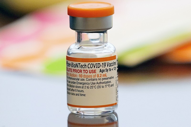 FILE - A vial of the Pfizer-BioNTech COVID-19 vaccine for children 5 to 12 years old sits ready for use at a vaccination site in Fort Worth, Texas, Thursday, Nov. 11, 2021. Kids ages 5 to 11 should get a booster dose of Pfizer’s COVID-19 vaccine, advisers to the U.S. government said Thursday, May 19, 2022. (AP Photo/LM Otero, File)