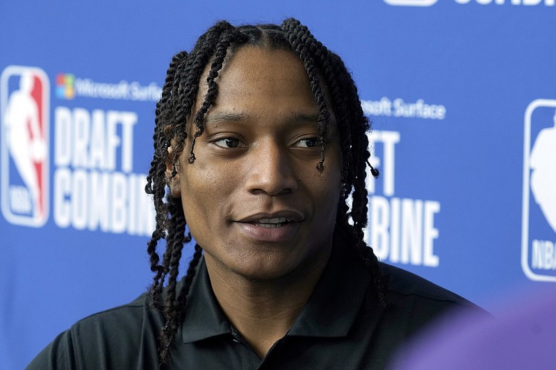 TyTy Washington, from Kentucky, talks with reporters during the NBA basketball draft combine at the Wintrust Arena, Thursday, May 19, 2022, in Chicago. (AP Photo/Charles Rex Arbogast)
