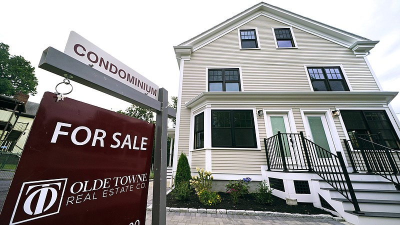 FILE - Condominium units are offered for sale in the Dorchester neighborhood, Wednesday, Aug. 18, 2021, in Boston. Rising interest rates are making adjustable-rate mortgages a more attractive alternative to common 30-year, fixed-rate home loans. (AP Photo/Charles Krupa, File)